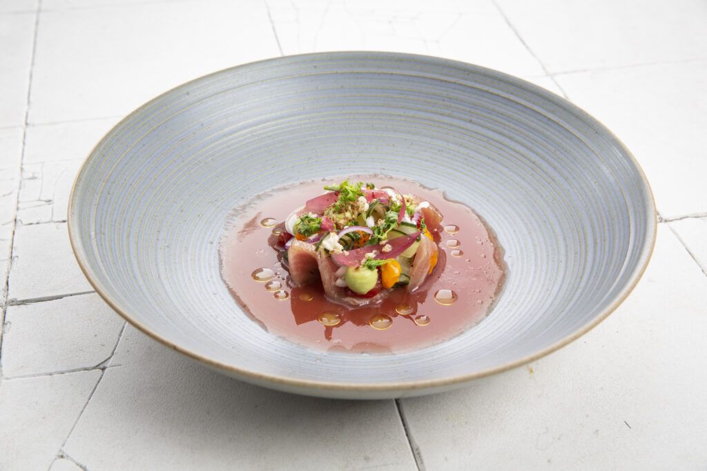 Belly tiradito | “Curated bloodline” | Watermelon | Ají Dulce | Avocado | Chicharrón | Onions | Cucu